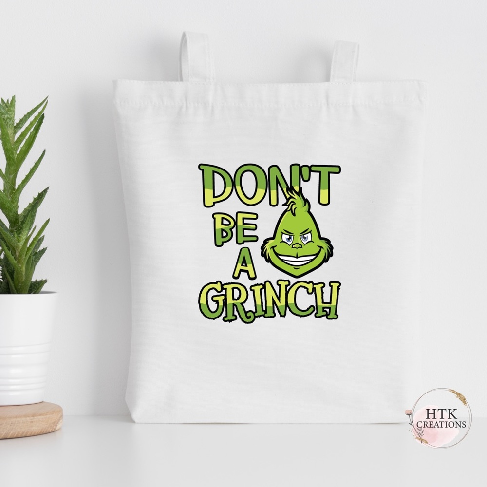 Don’t Be A Grinch Tote Bag